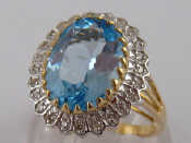 Appraisal: A yellow metal tests carat gold blue topaz and diamond