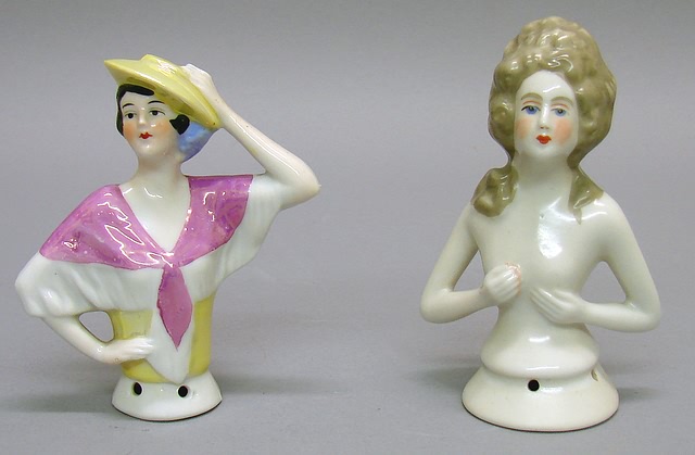 Appraisal: Pair of china half dolls Germany lady with molded hat