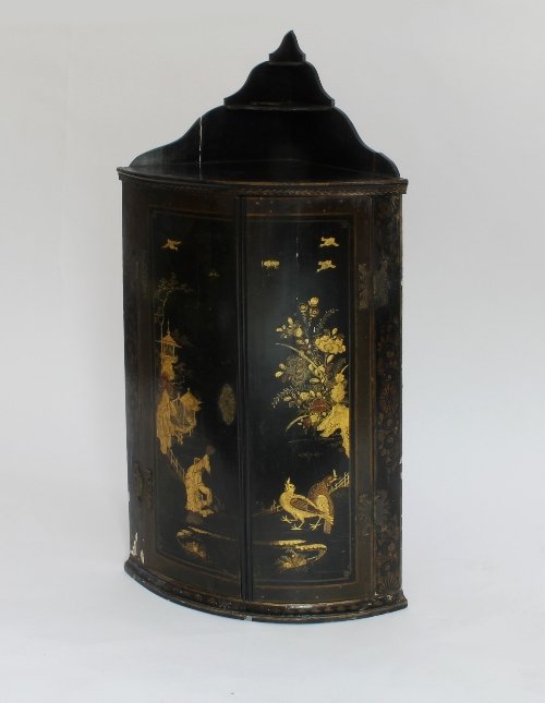 Appraisal: A Dutch japanned bow fronted hanging corner cupboard circa with