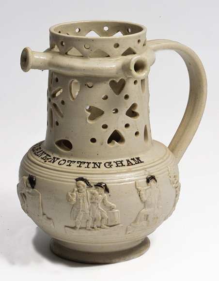 Appraisal: AN EARLY TH CENTURY SALT GLAZED ENGLISH PUZZLE JUG with