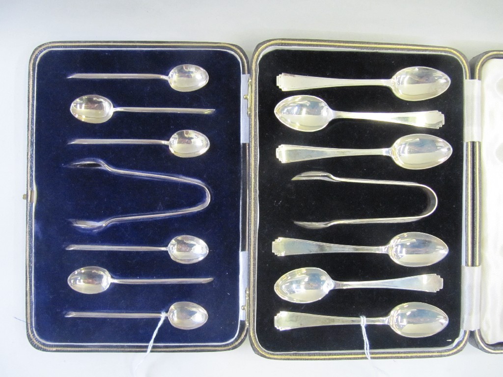 Appraisal: Lot comprising two cased sets of silver spoons and tongs