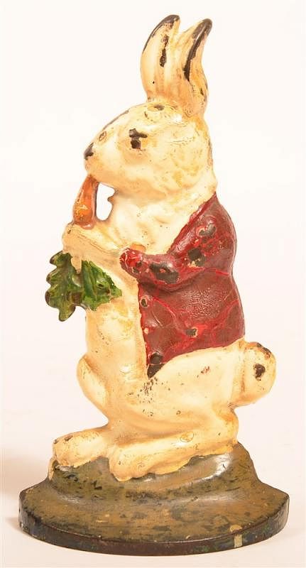 Appraisal: Cast Iron Peter Rabbit with Carrot Doorstop Cast Iron Peter