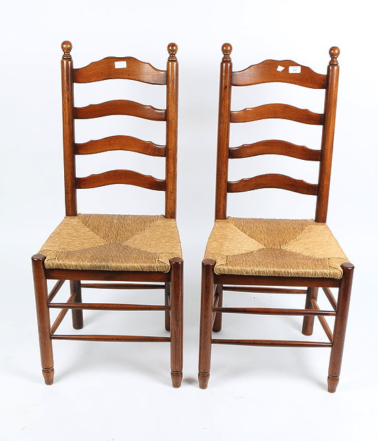 Appraisal: A SET OF TEN OAK LADDERBACK KITCHEN CHAIRS rush inset