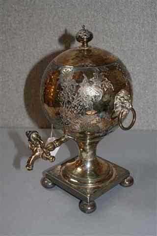 Appraisal: A SILVER PLATE SAMOVAR with a rounded body engraved with