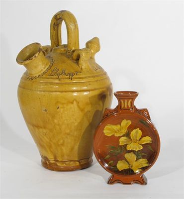 Appraisal: A Watcombe Pottery moon flask footed form painted with Californian