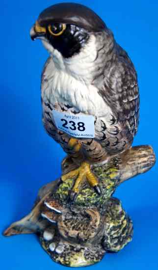 Appraisal: Royal Doulton Model of a Peregrine Falcon on branch HN