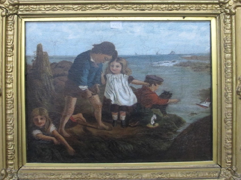 Appraisal: Oil on canvas of children playing by the seashore