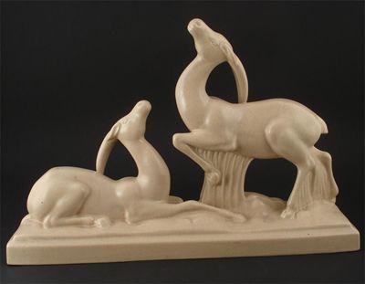 Appraisal: An Art Deco Lemanceau pottery group of two deer covered