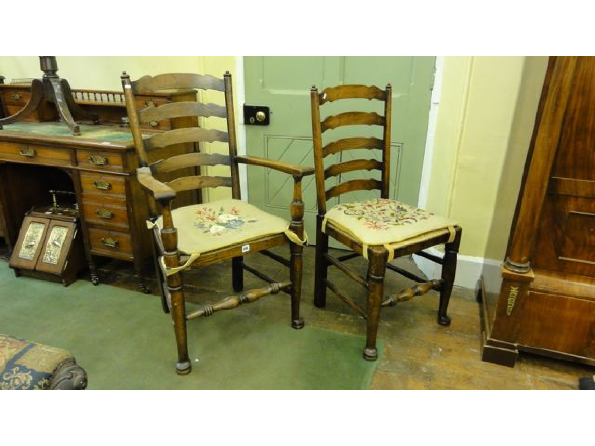 Appraisal: A set of antique oak ladderback dining chairs with rush