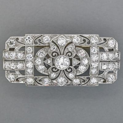 Appraisal: WALTON CO PLATINUM DIAMOND BROOCH ca Pierced panel set with