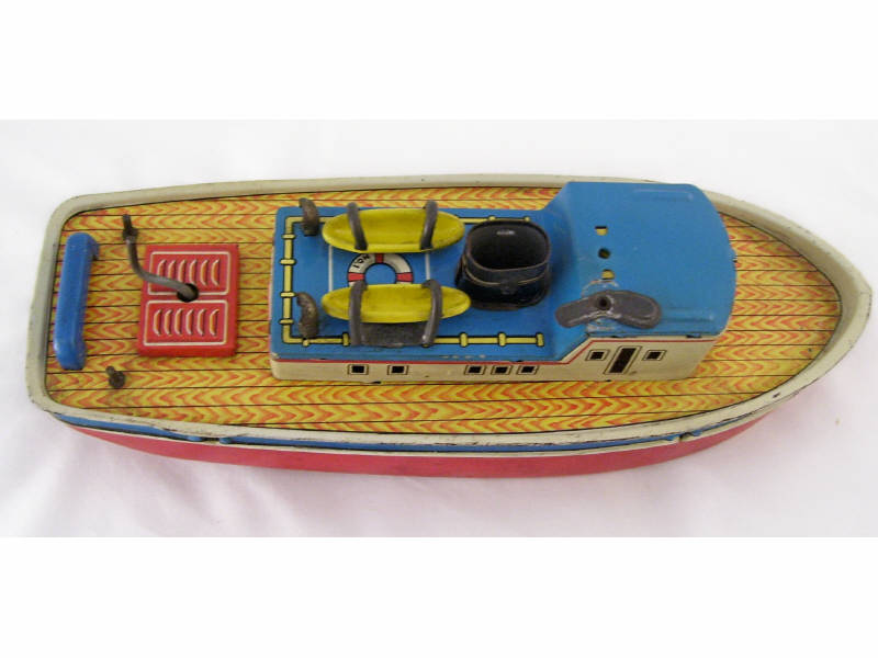 Appraisal: Tin Litho Boat Crank operation in working condition Colorful design