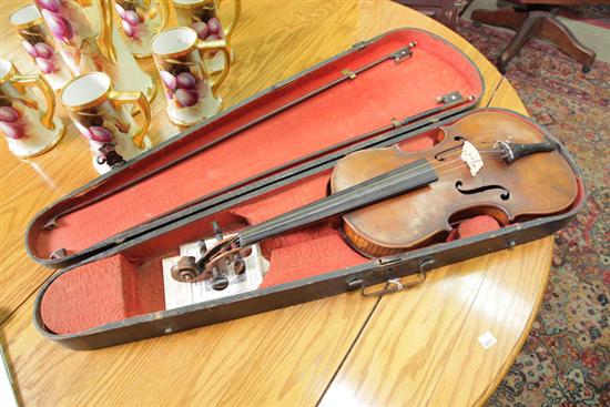 Appraisal: VIOLIN th century Curly maple body Comes in a fitted