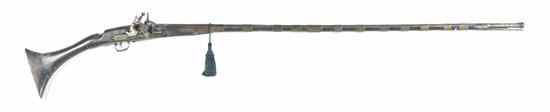 Appraisal: A Middle Eastern Flint Lock Rifle having a steel barrel