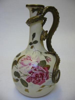 Appraisal: A ROYAL WORCESTER PORCELAIN EWER dated of globular form with