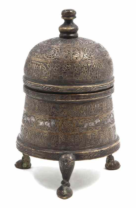 Appraisal: A Middle Eastern Silver Inlaid Bronze Box of tapering cylindrical