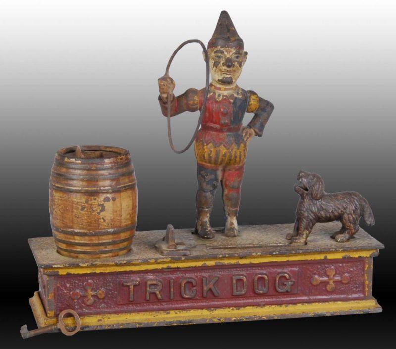 Appraisal: Cast Iron Trick Dog Mechanical Bank Description Trap and key