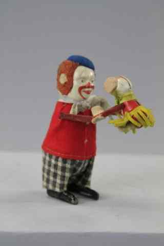 Appraisal: SCHUCO CLOWN DANCING WITH MOUSE Germany both tin each in