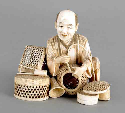 Appraisal: Japanese carved ivory figure of a basket maker ca h