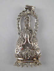 Appraisal: A white metal tests carat gold diamond Buddha pendant approx