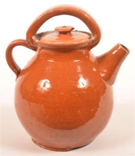 Appraisal: Glazed Redware Pottery Covered Jug Double applied handles tapered spout