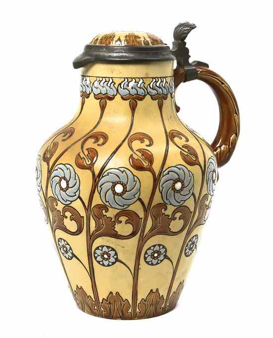 Appraisal: A Mettlach Pottery Tankard having pewter mounts and polychrome foliate