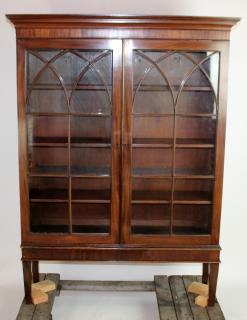 Appraisal: Sheraton style door vitrine in mahogany with paned glass and