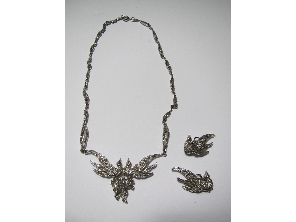 Appraisal: A white metal and marcasite necklace and pair of clip