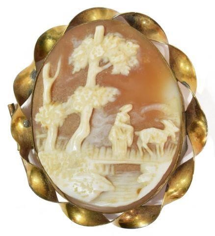 Appraisal: Victorian cameo brooch gold-tone oval frame centering carved cameo shell