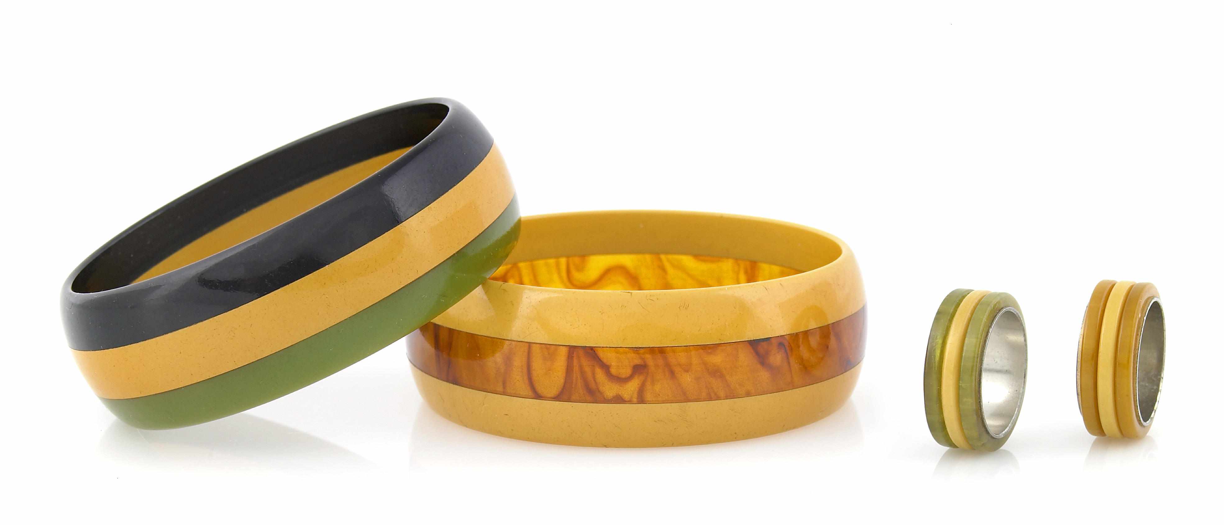 Appraisal: Two striped laminate Bakelite bangle bracelets with two similar rings