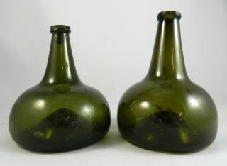 Appraisal: th c Dutch wine bottles Wine- th c Dutch olive