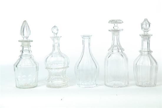 Appraisal: FIVE GLASS DECANTERS American and English mid th century All