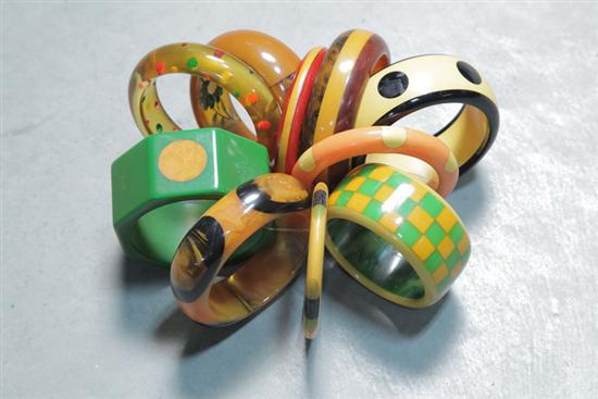 Appraisal: TEN BRACELETS Most bakelite Five with inlaid dots three laminated