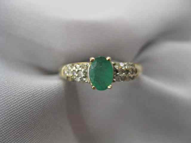 Appraisal: Emerald Diamond Ring carat oval gem with diamonds on each