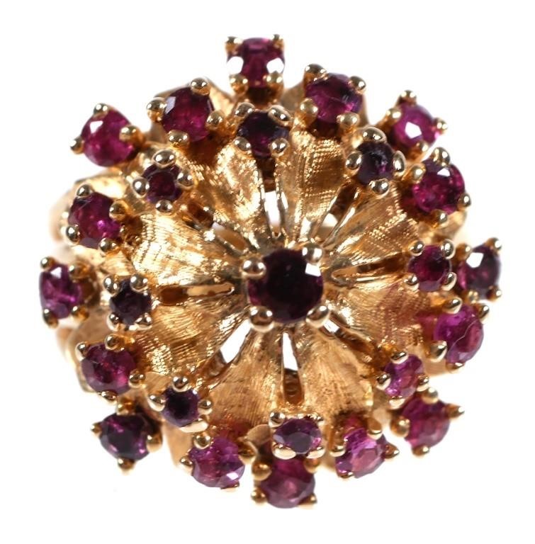 Appraisal: K YELLOW GOLD AND RUBY FLORAL DOME RINGSet in K