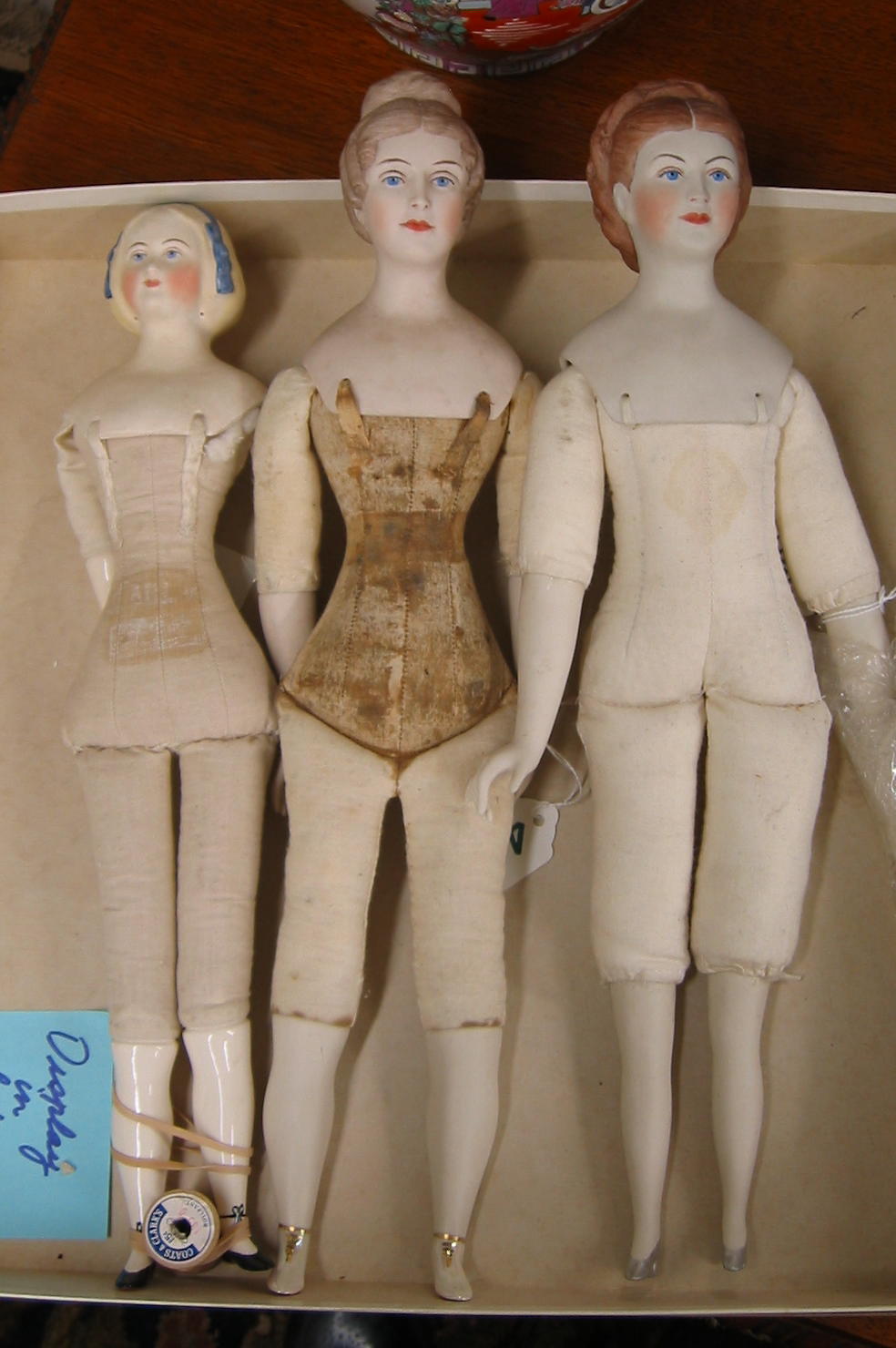 Appraisal: A GROUP OF THREE GRACE LATHROP SIGNED PARIAN PORCELAIN DOLLS