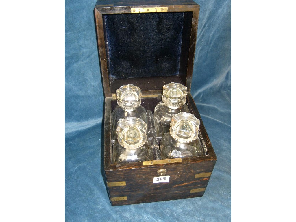 Appraisal: An early th century travelling decanter set enclosed in a