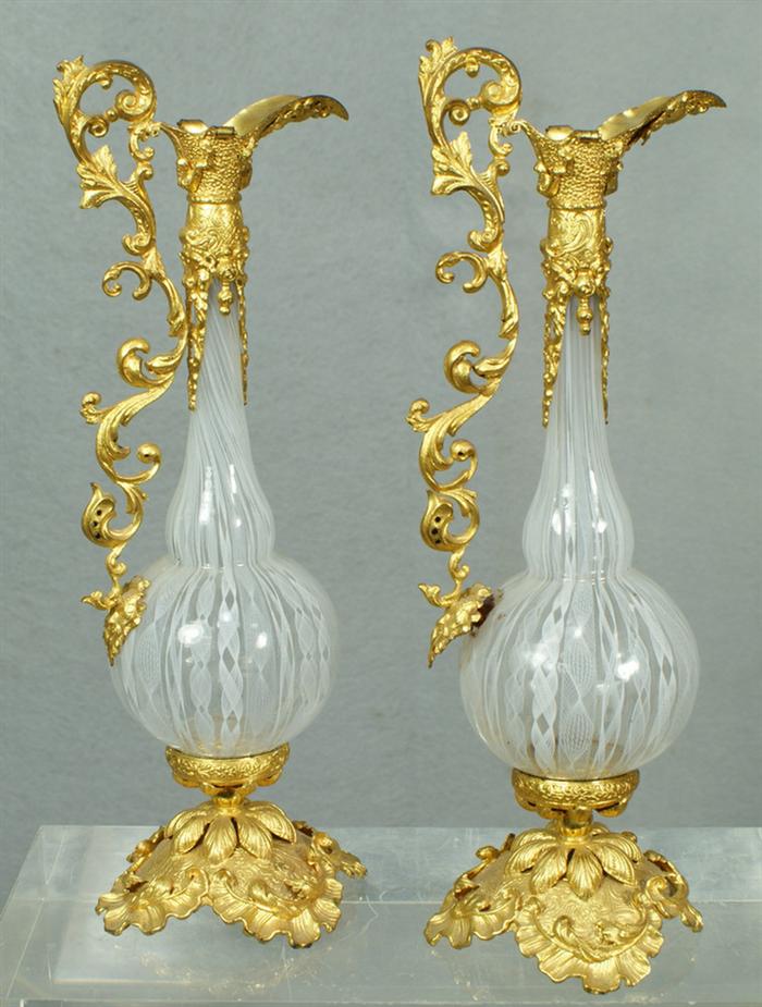 Appraisal: Pair of Venetian Latticino and gilt bronze ewers h c