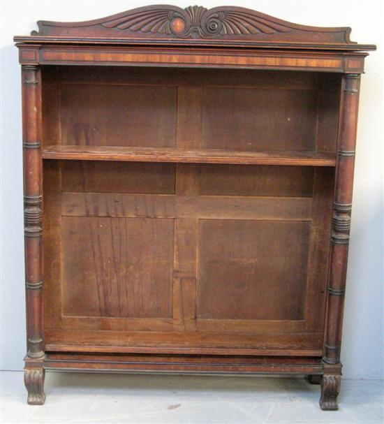 Appraisal: Mahogany open bookcase th century with raised and carved scrolling