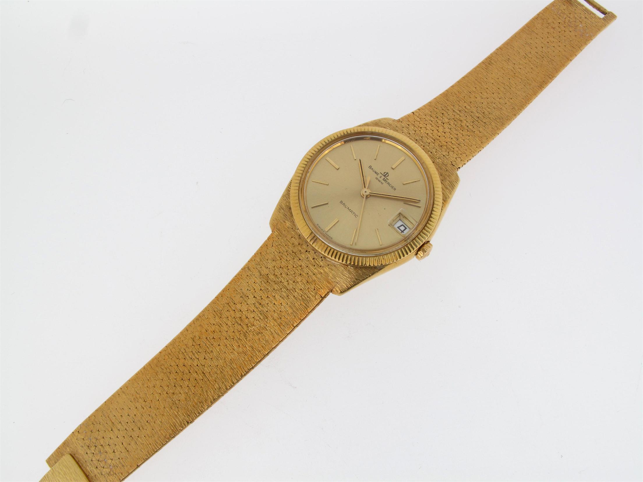 Appraisal: A gold wristwatch by Baume amp Mercier Baumatic model with