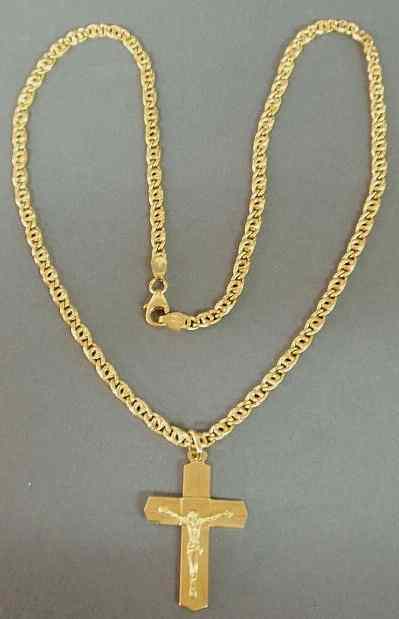 Appraisal: Crucifix pendant on chain k yg crucifix supported by a