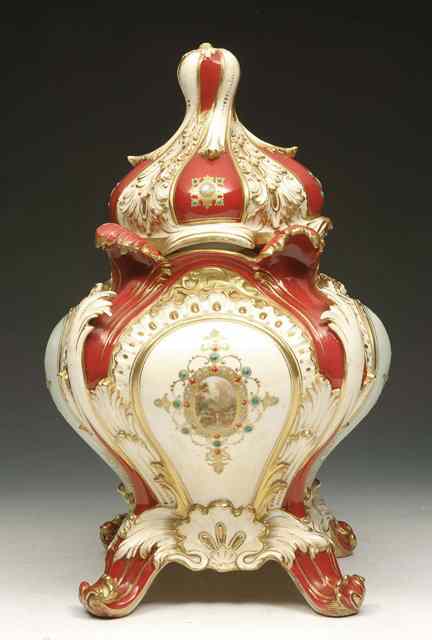 Appraisal: A COALPORT VASE AND COVER of bomb and rococo form