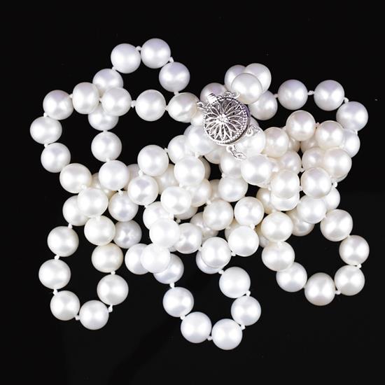 Appraisal: Double strand of pearls mm cream pearls with K white