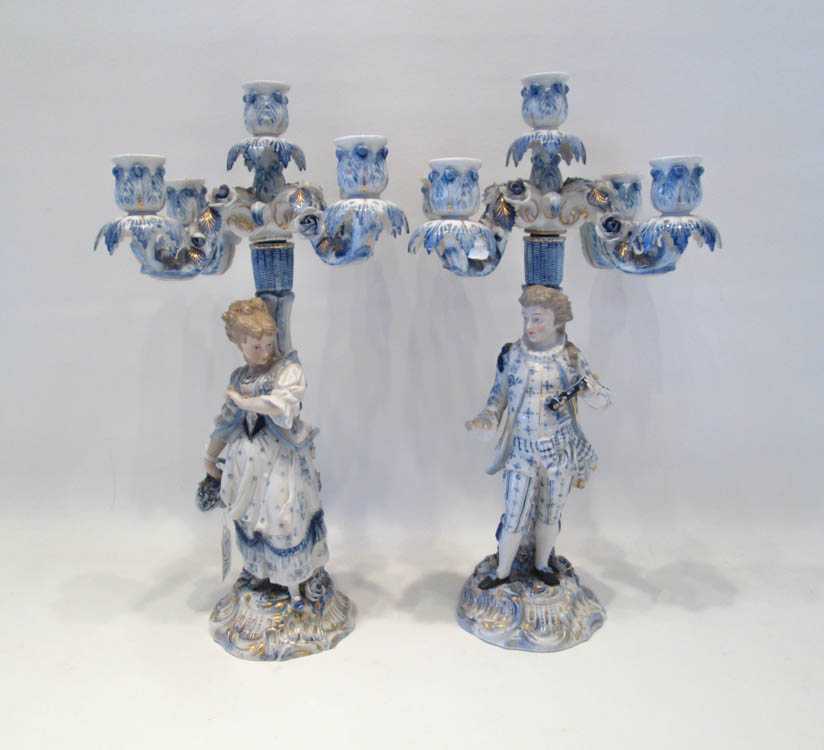 Appraisal: A PAIR OF GERMAN PORCELAIN FIVE-LIGHT CANDELABRA the standards depict