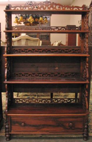 Appraisal: An antique mahogany etagere with five open shelves having reticulated