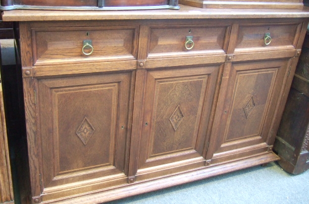 Appraisal: An early th century Continental oak sideboard with a pair