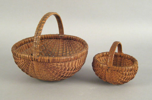 Appraisal: Two small Pennsylvania split oak baskets th c each with