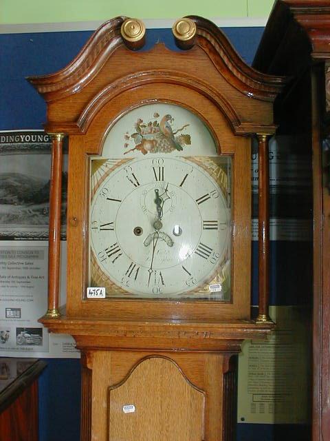 Appraisal: A thC oak longcase clock with swan neck pillared hood