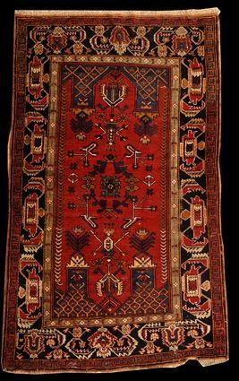 Appraisal: PERSIAN DOUBLE PRAYER RUG The wine red field with floral