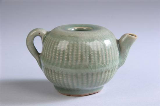 Appraisal: CHINESE CARVED LONGQUAN CELADON PORCELAIN TEA POT - in high