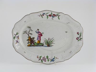 Appraisal: A Strasbourg fa ence dish painted with an Oriental figure